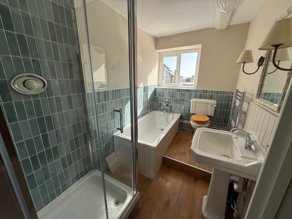 Lot: 81 - FREEHOLD INVESTMENT - Bathroom with bath and shower